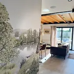 Holiday home Maison Des Passeroses